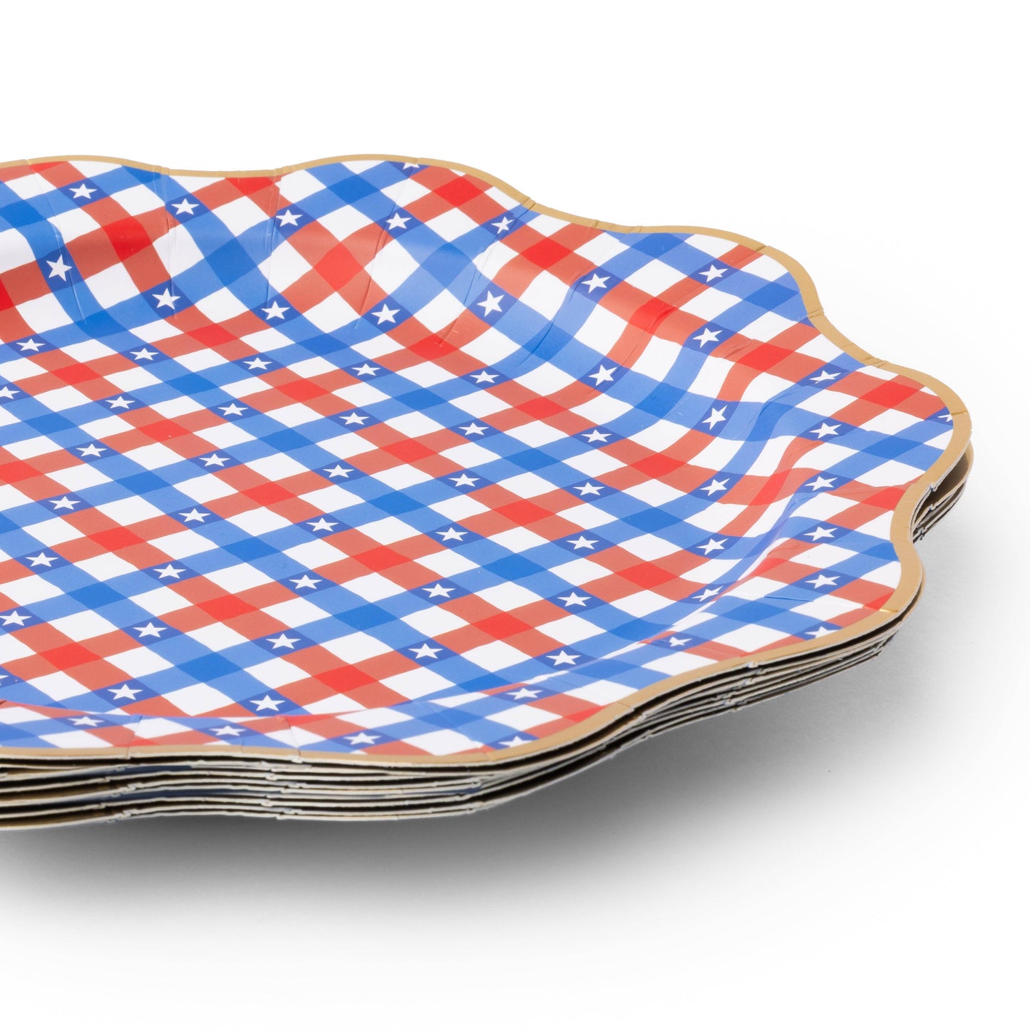 Stack of paper plates with red, white, and blue pattern on a white background