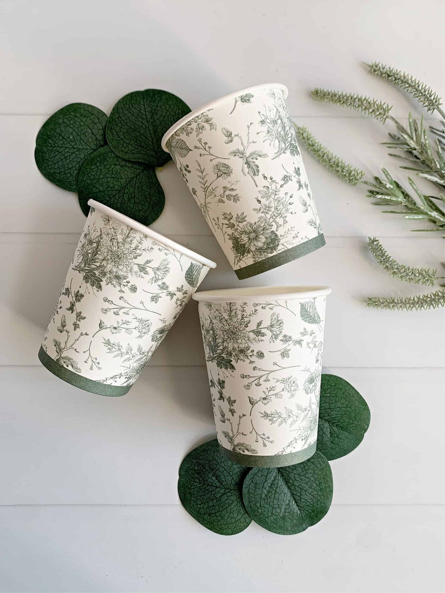 Introducing our elegant set of 8 Sage Green French Toile Paper Cups, crafted with high-quality paper. These cups are not only visually appealing but also environmentally friendly. The charming white and sage green color