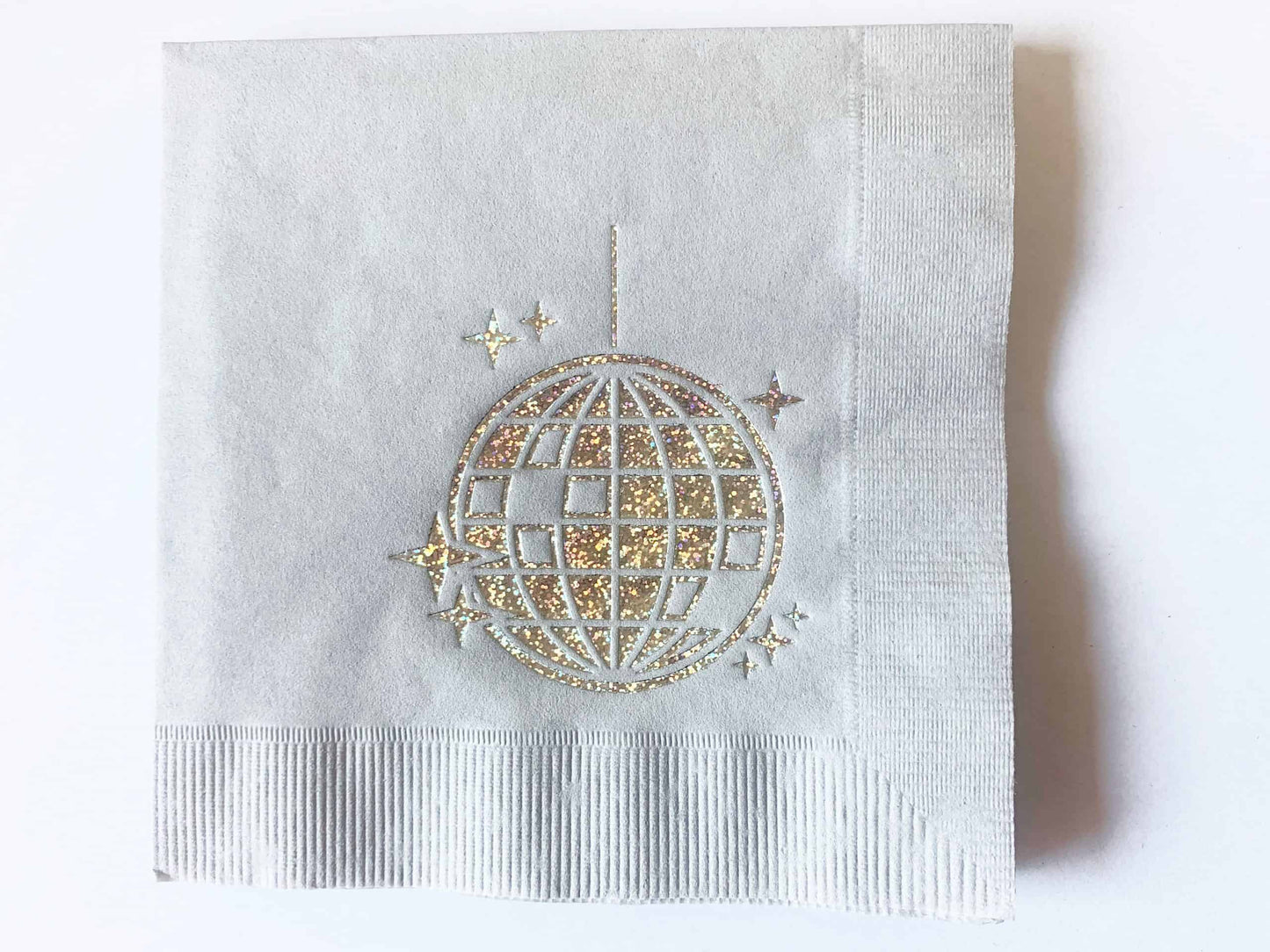Disco Ball Cocktail Napkins with elegant iridescent foil on a silver cocktail napkins