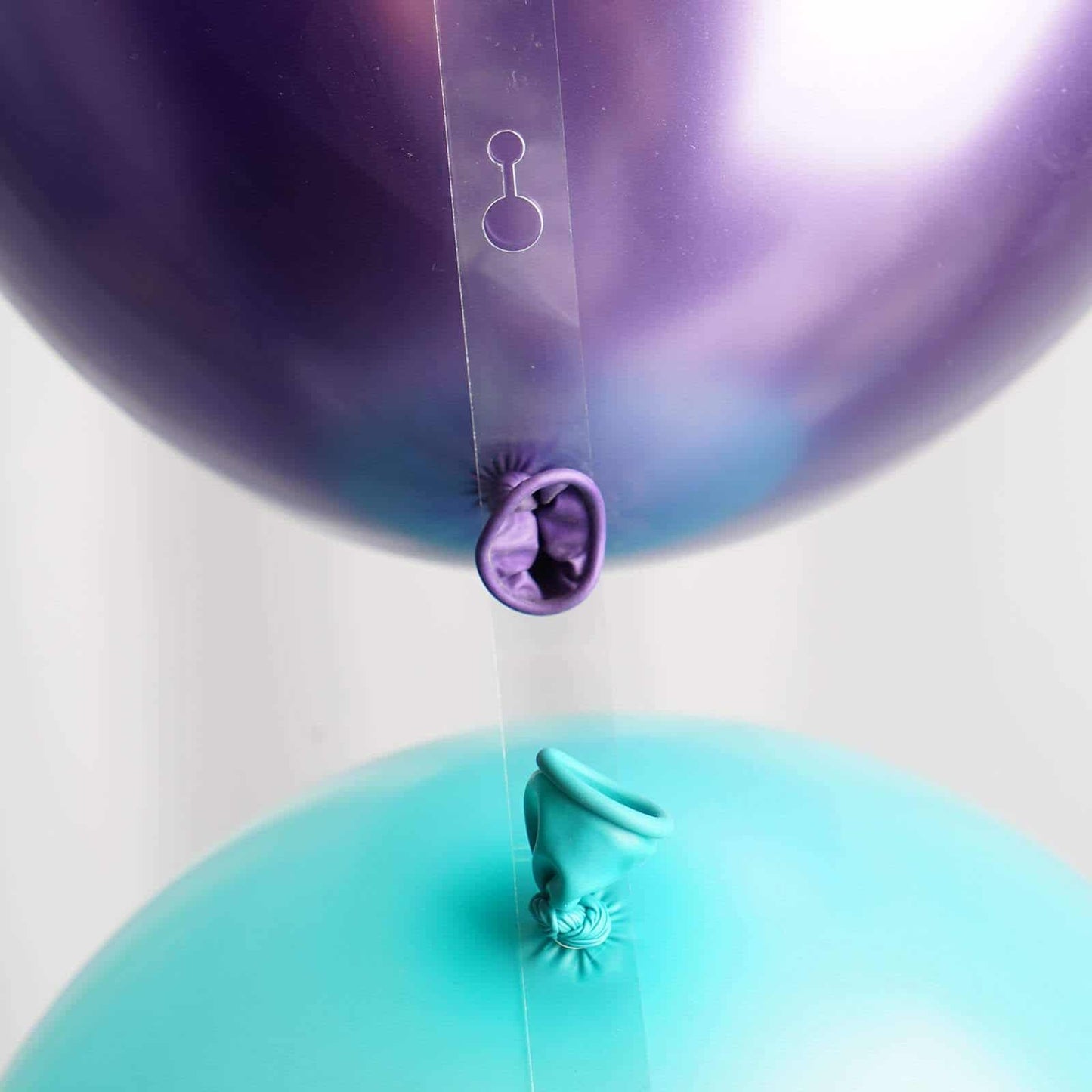 Balloon garland tape is one of the best techniques for creating a balloon garland without going crazy.