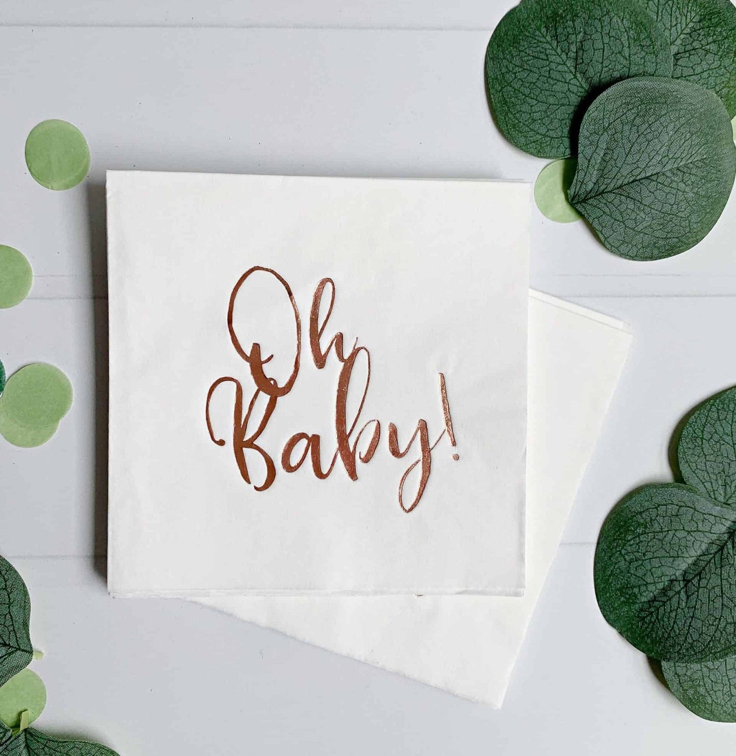Oh Baby rose gold foil on white cocktail napkins - the perfect accent to your baby shower. Sweet and sophisticated napkins are unique. These gorgeous rose gold foiled "Oh Baby" napkins are an EnFete original product. You won't find them anywhere else!