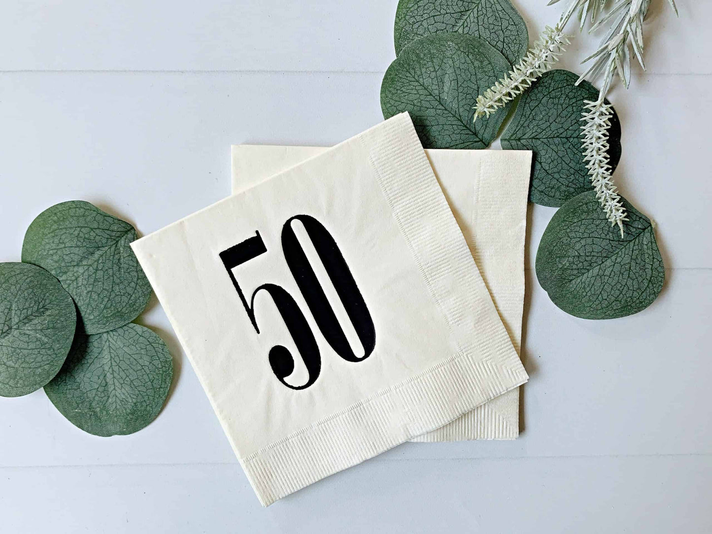 50th birthday napkins in ivory with sharp retro numbers - perfect for a husband's 50th birthday celebration
