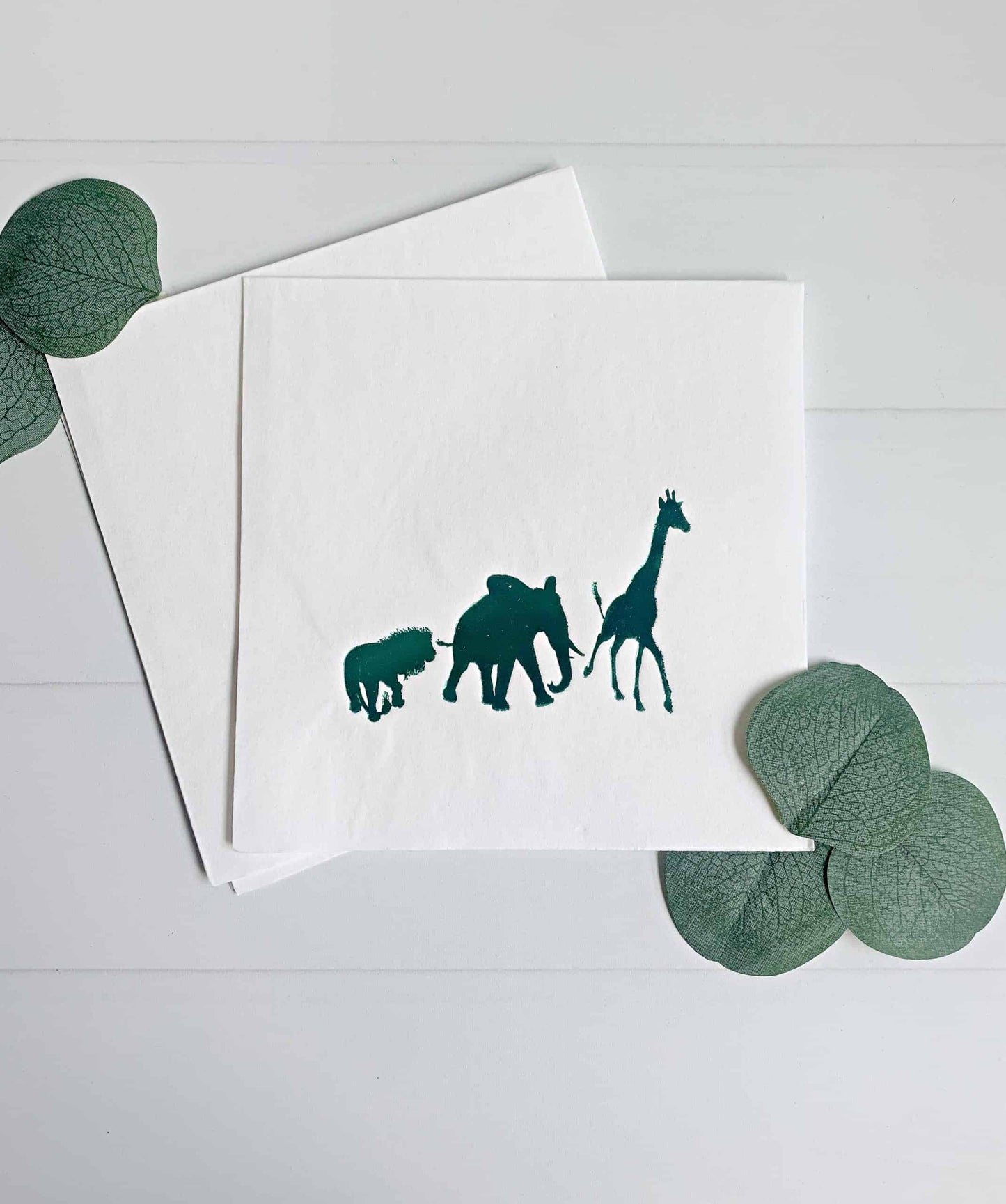 Elevate your safari-themed celebration with our stunning Emerald Green Safari Party Napkins. These exquisite napkins feature captivating safari animals adorned in rich emerald green foil on a crisp white background, making them the perfect accent for your safari baby shower, wild one party, or any safari-inspired event.
