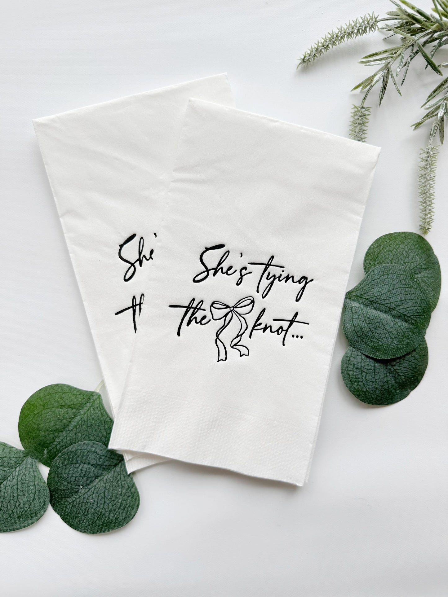 Introducing our "She's Tying The Knot" black and white Dinner Napkins, featuring a chic preppy bow design that adds a touch of elegance to your bridal shower or bachelorette party