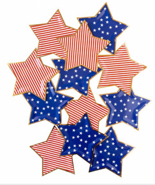 Collection of red, white, and blue star-shaped plates for party decorations on a white background