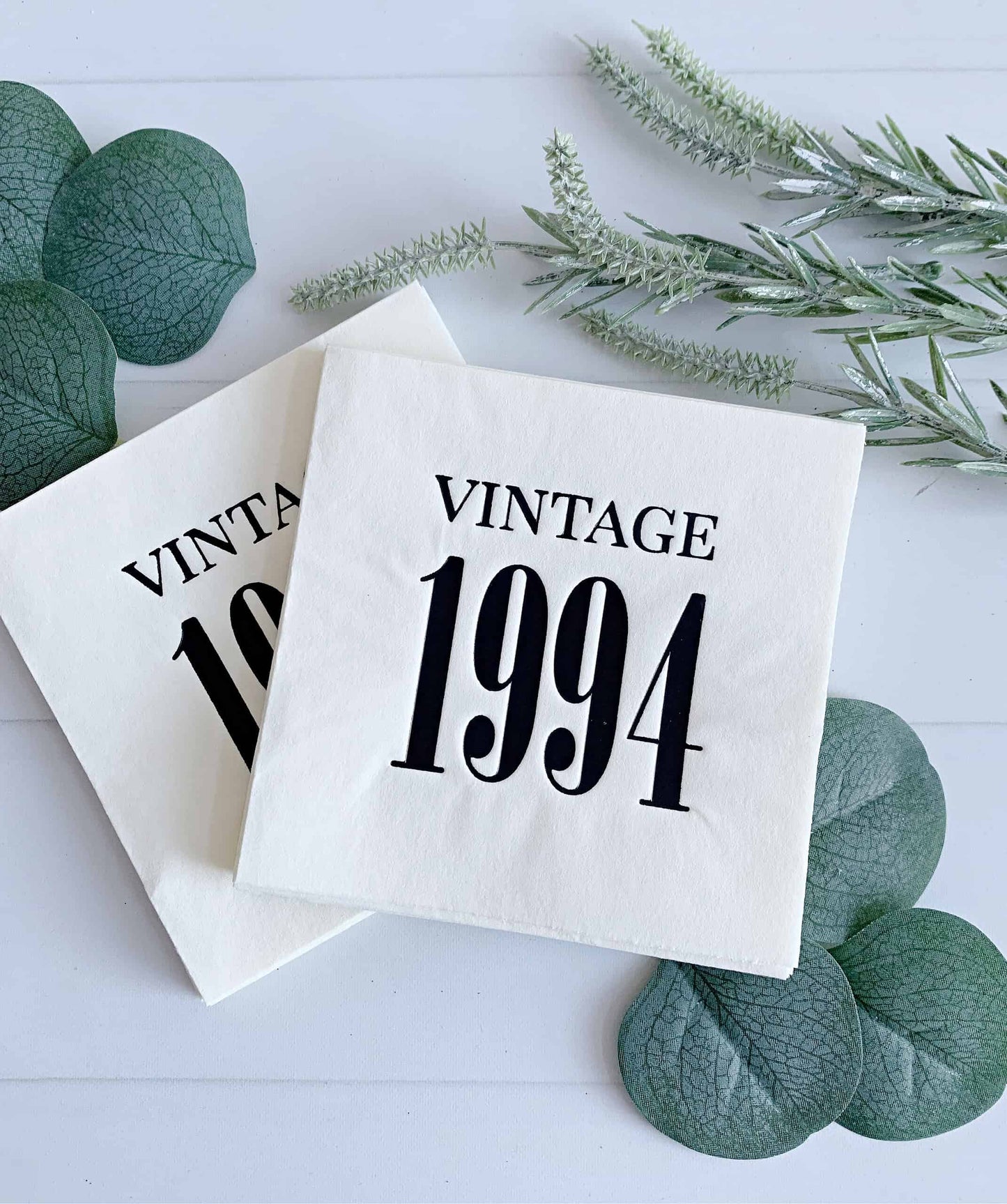 our Vintage 1994 ivory with black foil cocktail napkins. These meticulously crafted napkins pay tribute to the timeless charm of 1994 and are the perfect addition to your milestone 30th birthday party or anniversary celebration.