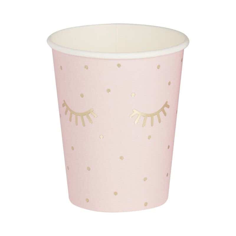 Blush paper cups with cute gold foil eyelashes perfect for a pampering bridal shower or birthday