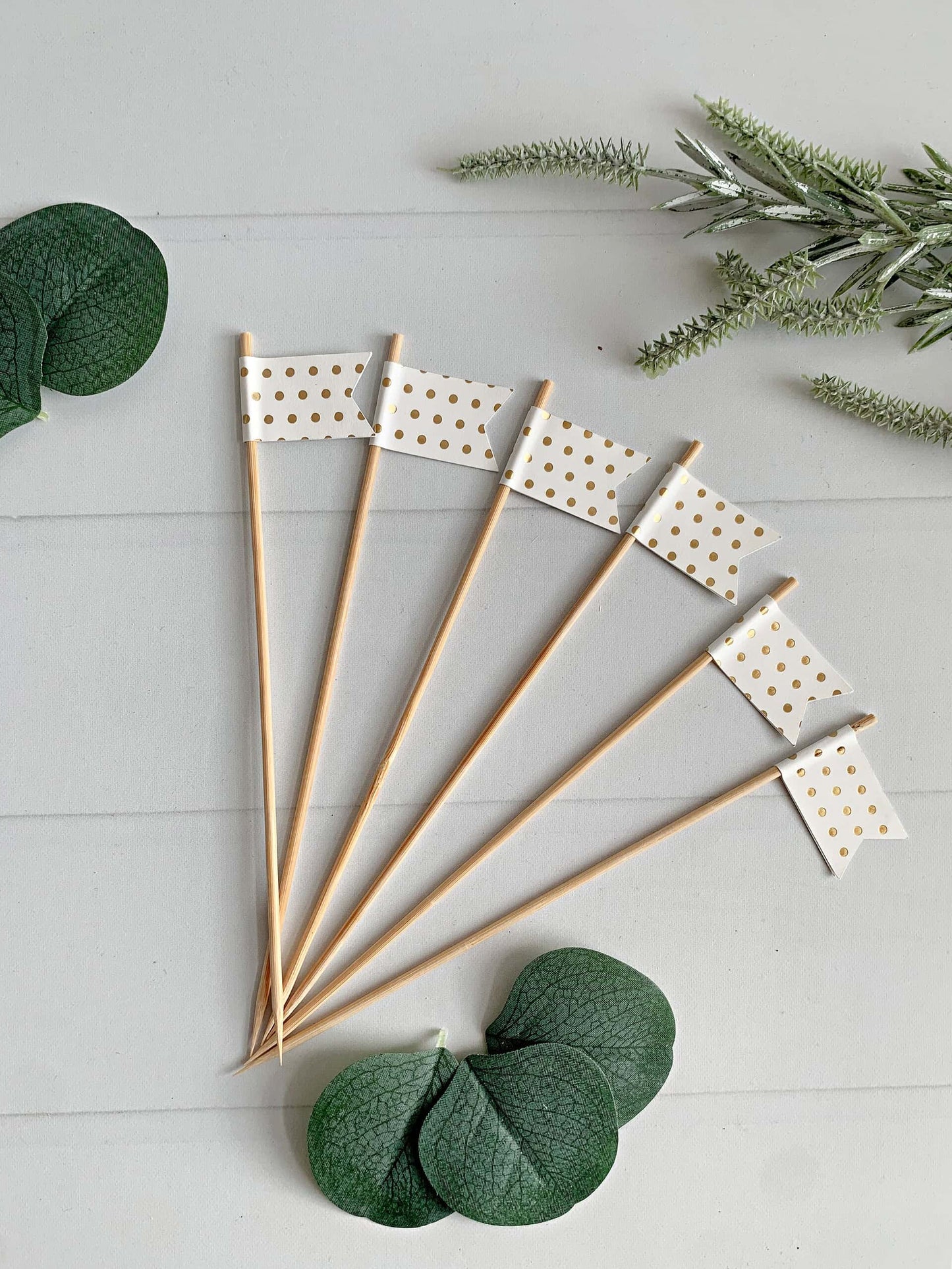 Introducing our exquisite set of six Charcuterie Picks, designed with a delightful combination of white and gold polkadots for an elegant touch. These meticulously crafted hoagie flags are a must-have addition to elevate