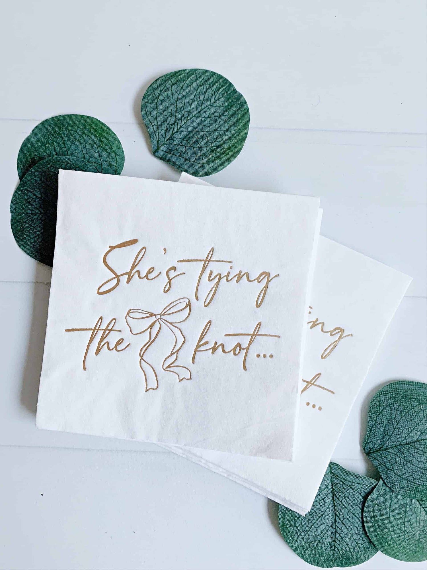 Welcome to our "She's Tying the Knot" collection, where we celebrate the bride-to-be in style with an array of elegant and sophisticated products designed to make her wedding shower unforgettable. Introducing our "She's Tying The Knot" Cocktail Napkins, a