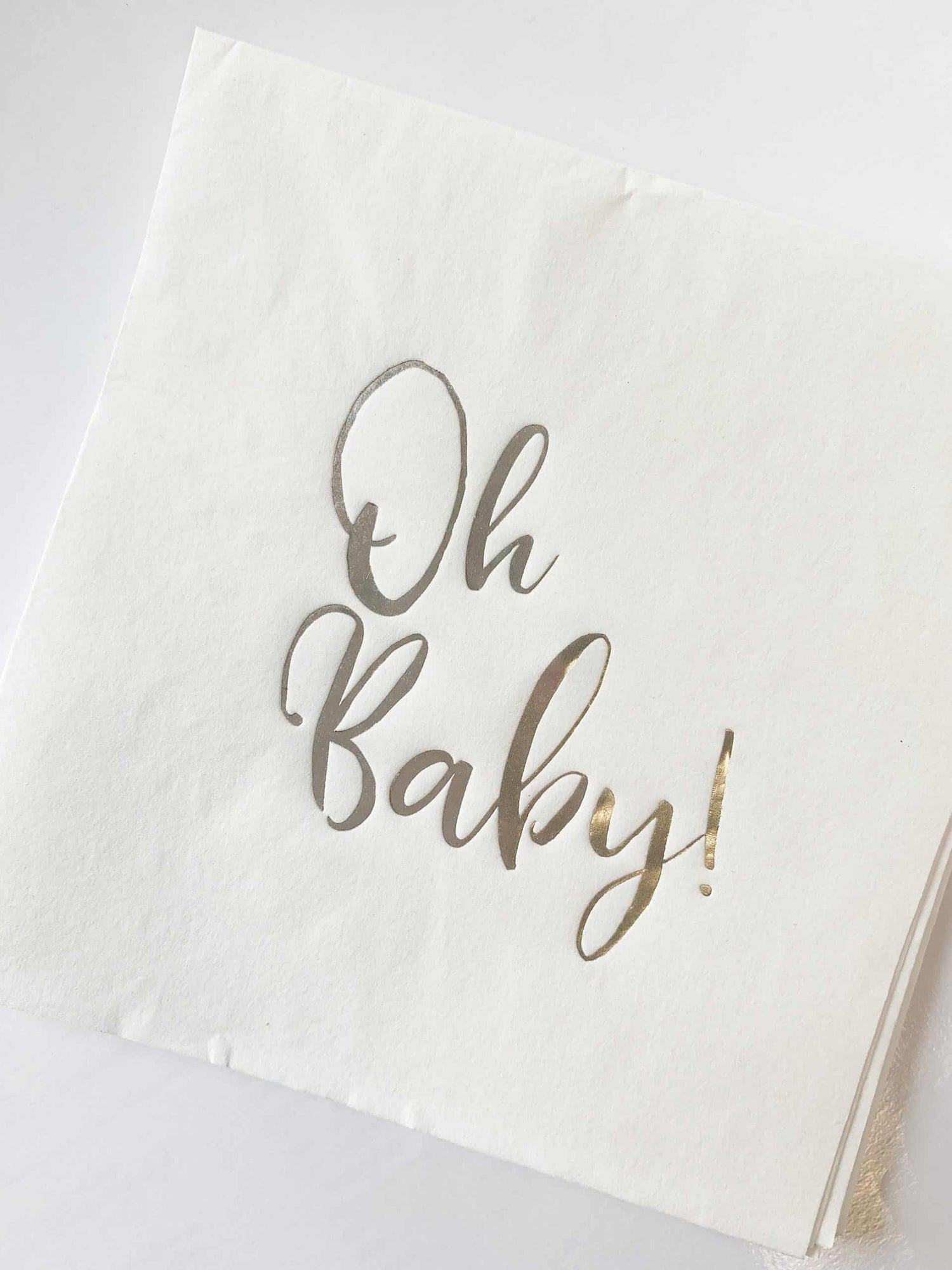 Silver Oh Baby Luncheon Napkins with an elegant Oh Baby script in silver foil.