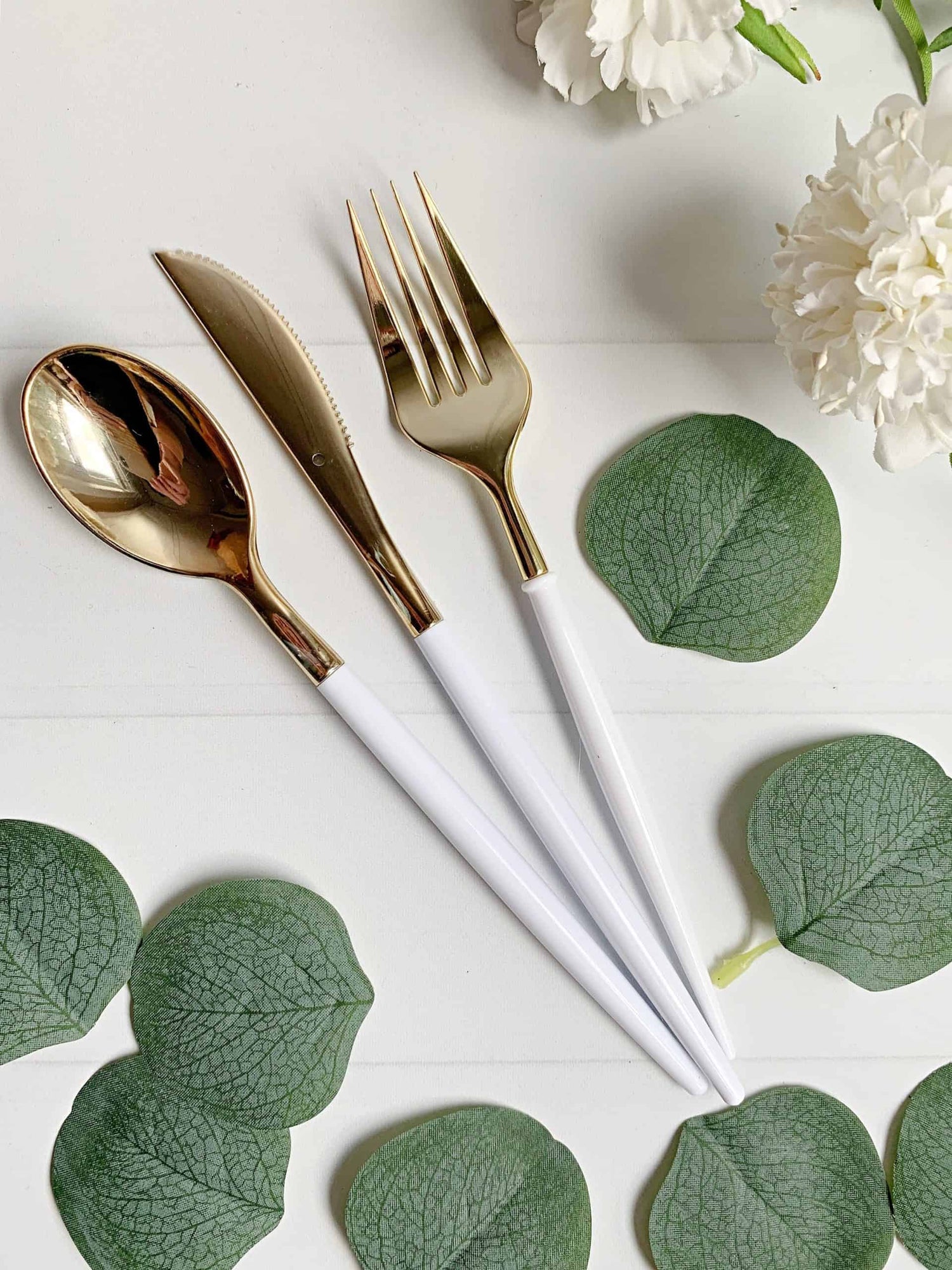 modern gold utensils - forks, knives, spoons and picks. Serving utensils and other options for your party or wedding.