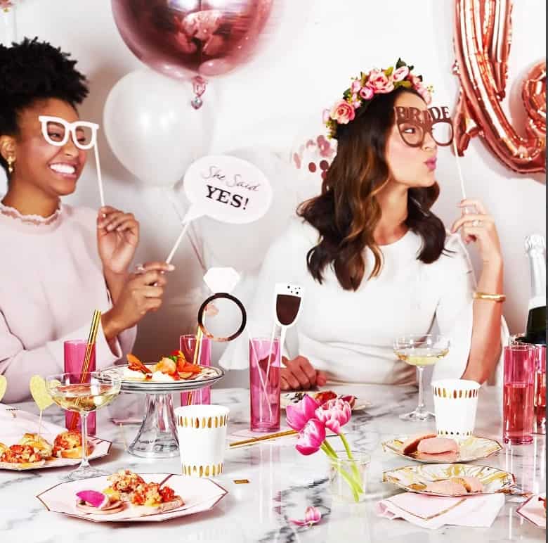 Set of 14 Rose Gold Wedding Photo Props or Bridal Shower Photo Props, made of high-quality cardstock with rose gold foil details, mounted on wooden dowels for easy handling and photographing. Add an extra layer of fun to your party with our collection of 