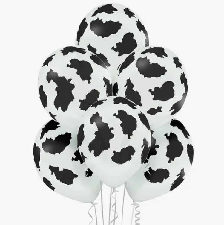 Space Cowgirls" Bachelorette party with cowprint balloons and cupcake wrappers, disco ball napkins, and shiny silver accents