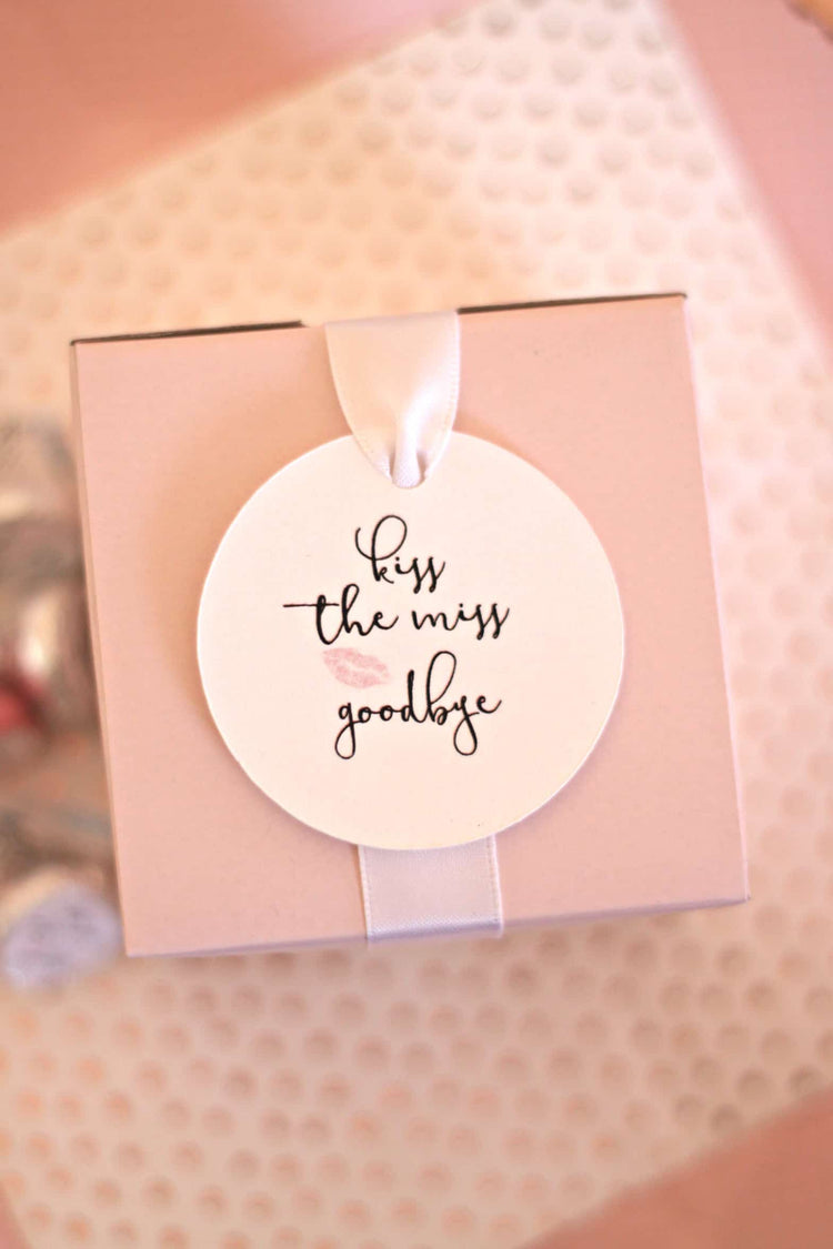 Kiss the Miss Goodbye Favor tags for thank you gifts on a gorgeous light blush pink favor box for your party favors