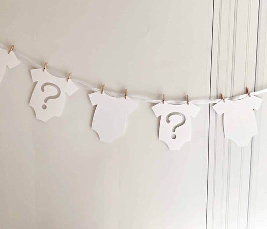 Introducing our charming White Gender Reveal Onesie Banner, perfect for celebrating the boy or girl on the way! This delightful banner features 7 adorable onesie-shaped cutouts, crafted with care and handmade exclusively by EnFete.