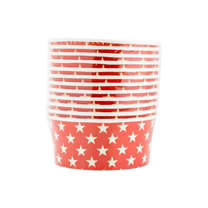 Red and white patterned cup with star design on a white background
