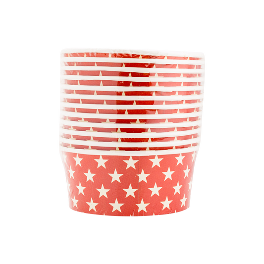 Red and white patterned cup with star design on a white background