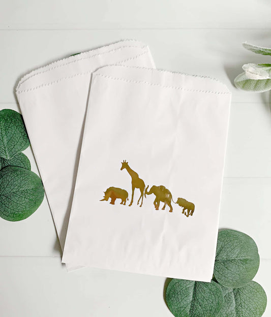 Perfect for a safari baby shower or Wild One birthday party. These safari baby shower favor bags are a great way for guests to take goodies home from your baby shower. Use for a donut wall display, a candy bar or for cookies. (Stickers are available in the shop to use as seals.)