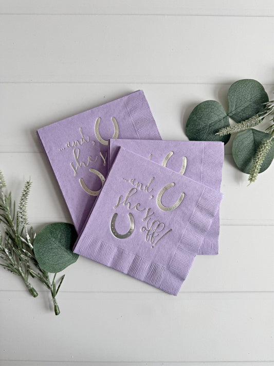 If you're throwing a Kentucky Derby party, graduation party, tea party, or bridal shower, EnFete's "And She's Off" silver foil on lavender cocktail napkins will add a touch of charm to your event.