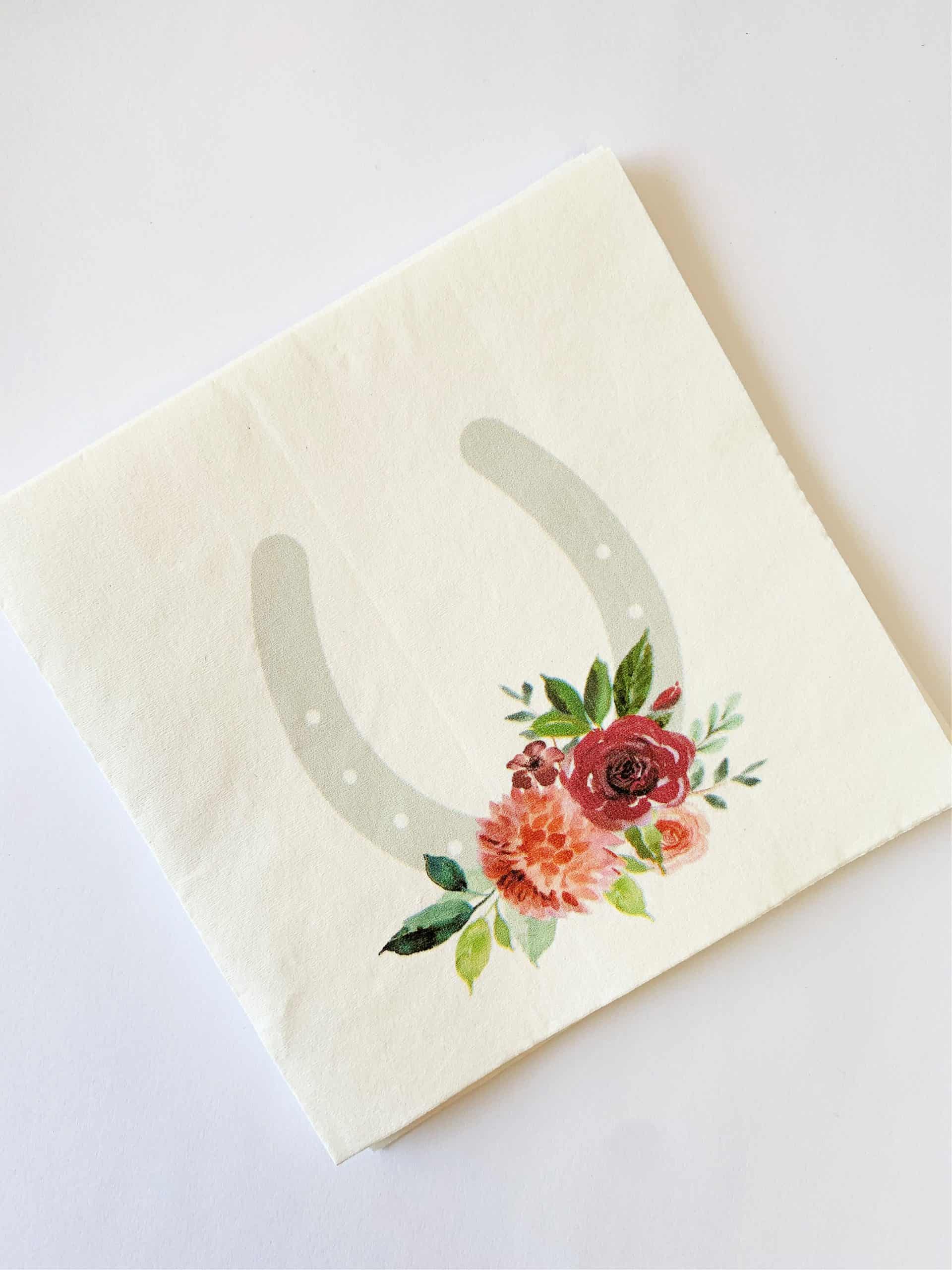 Kentucky Derby Cocktail Napkins with a grey horse show with coral and plum watercolor roses by EnFete LLC Elevate your Kentucky Derby party with EnFete's original and elegant Kentucky Derby napkins. Add sophistication to your celebration. #KentuckyDerby #ElegantNapkins #EnFete.