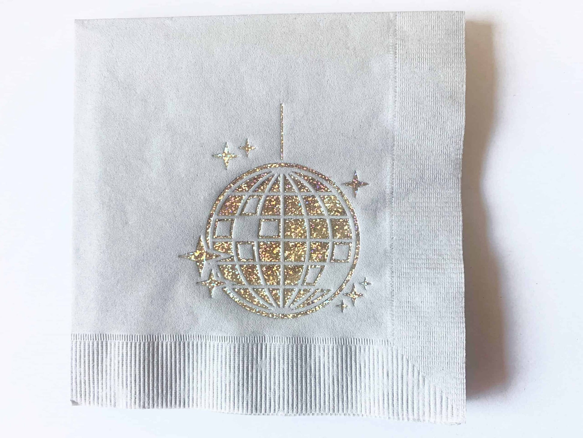 Disco Ball Cocktail Napkins with elegant iridescent foil on a silver cocktail napkins