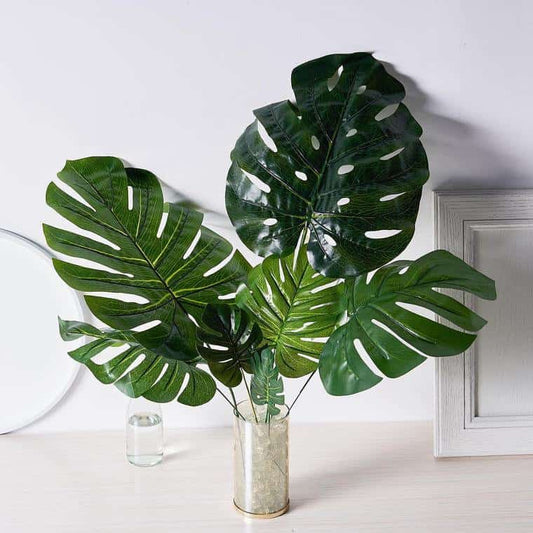 Artificial Monstera Leaves for a Safari party or baby shower - unique and elegant party backdrop and decor ideas from EnFete Party Supplies