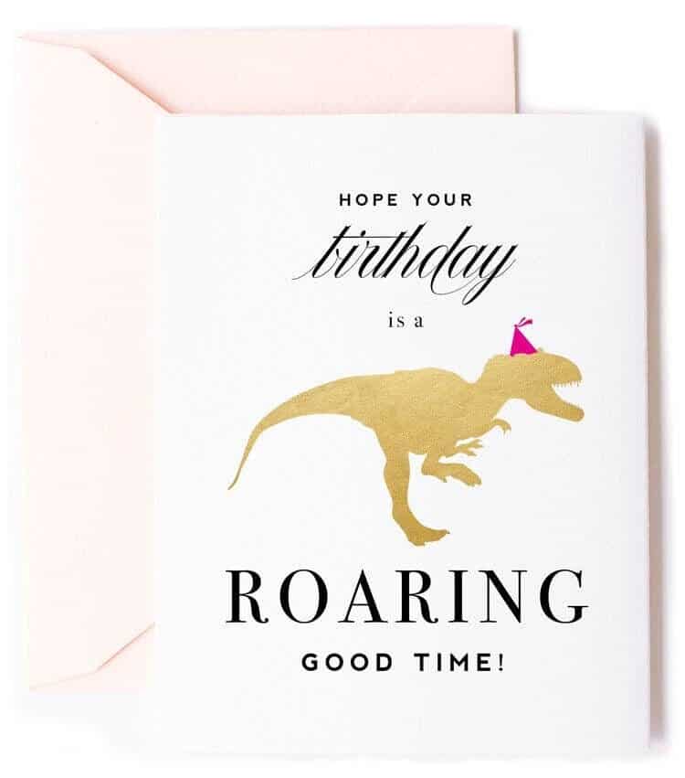 Our gold foil dinosaur birthday card is a fun and stylish way to send your birthday wishes. The card features a whimsical gold dinosaur and the words "Have a Roaring Good Time" in playful gold foil. The card is 4.25" x 5.5" when folded, printed on high-quality white card stock, and comes with a blush A2 envelope. The blank interior is perfect for writing a personalized message to the recipient.