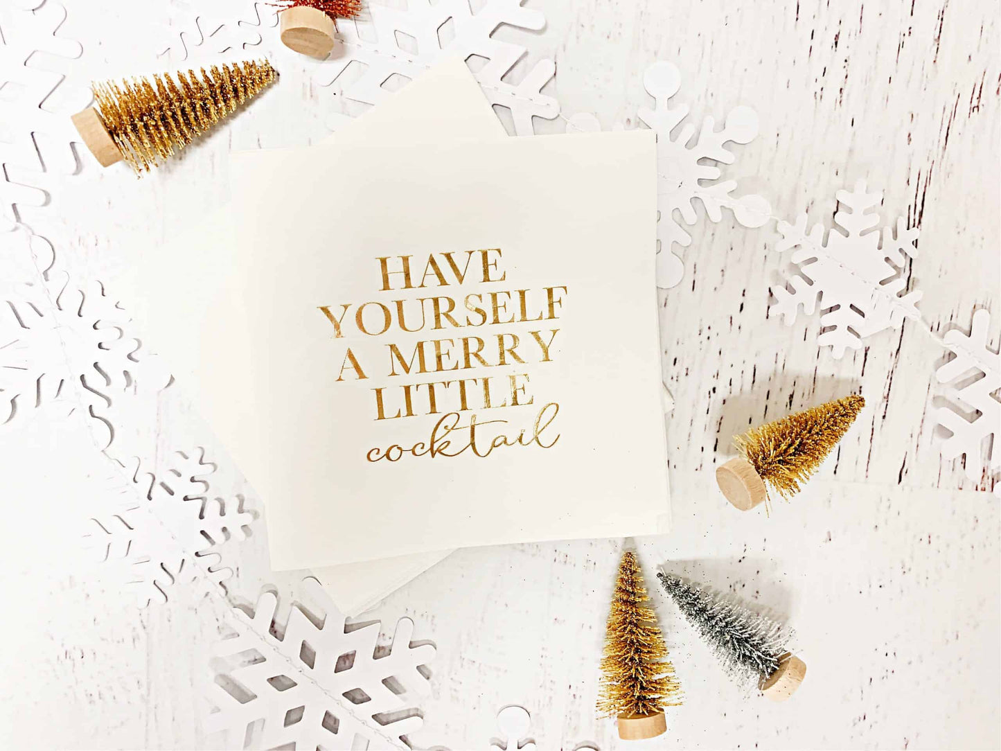 Gold foiled "merry little cocktail" napkins are fun to use the WHOLE holiday season. Perfect for everything from Friendsgiving, Thanksgiving, Christmas, and New Year's!