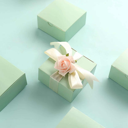Beautiful mint/soft sage cake, donut or favor boxes. Give away a piece of your delightful party cake in these glossy-finished cake or donut boxes. Our high-quality boxes are crafted from upscale embossed cardboard. The impeccable sheen and seamless luster of these gorgeous cake boxes will leave your guests truly impressed.