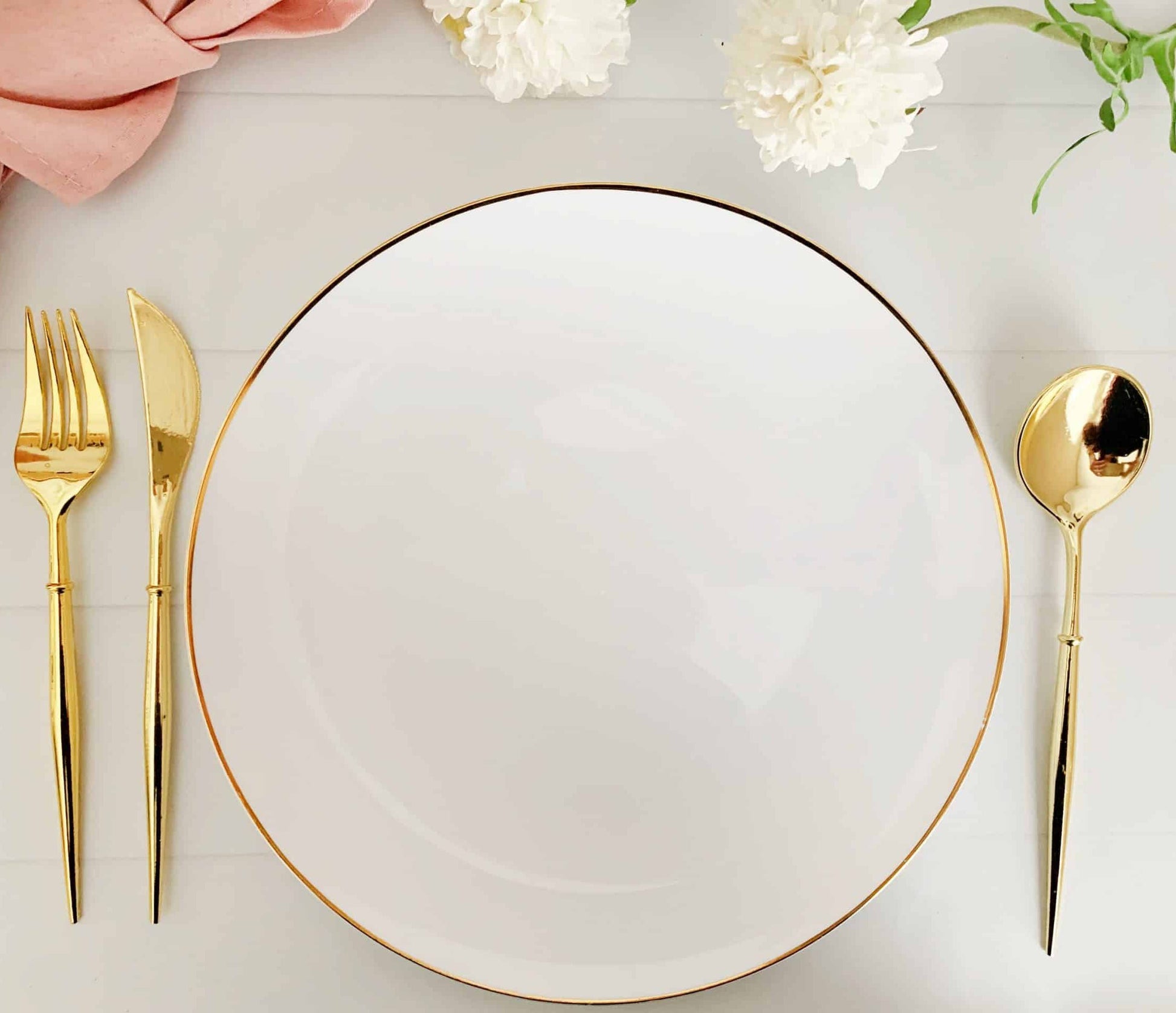 gant tablescape. Ideal for weddings, bridal showers, baby showers, and other special events, these plates will elevate any dining experience with their stylish design. Made with high-quality plastic, they are sturdy and durable enough to hold all types of dishes and desserts, and their gold edging adds a touch of luxury to the overall look. They are also disposable for easy clean-up, making them a convenient option for large events.