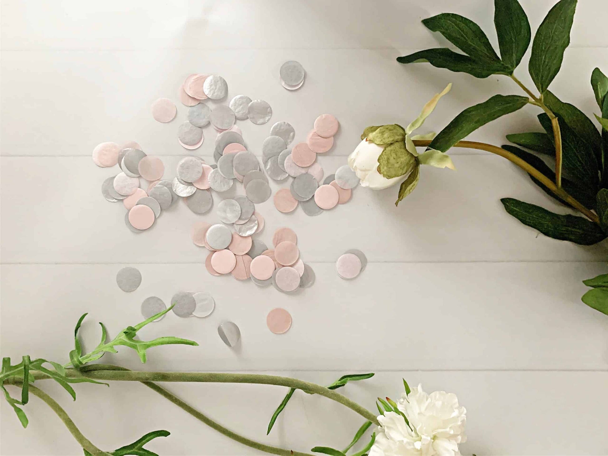 Silver and blush tissue paper confetti.