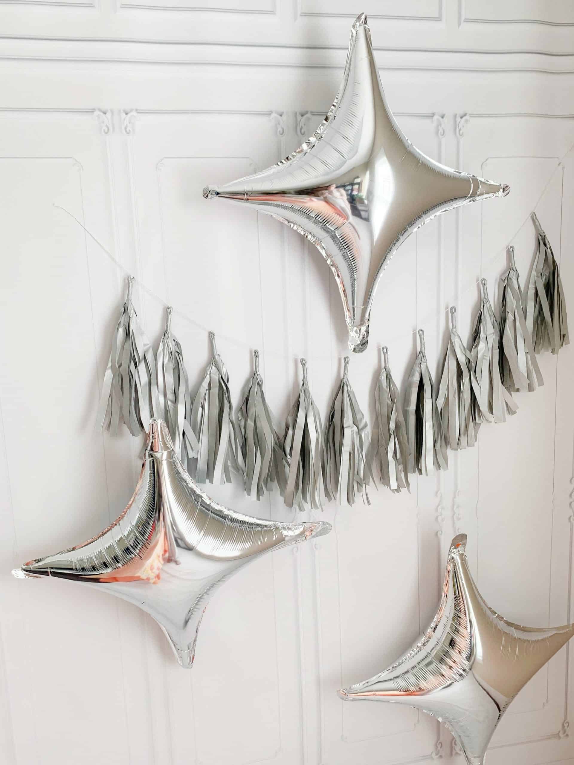 last disco balloons and silver tassel garland