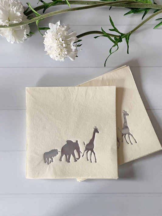 Welcome to EnFete's Safari Party Supplies Collection, where adventure meets elegance in a wild celebration of style and sophistication. Our Safari Party collection is designed to bring the untamed beauty of the jungle to your event, whether it's a birthday bash, baby shower, bridal shower, or any special occasion that calls for a touch of exotic charm. Step into the enchanting world of the savanna with our exquisite Gold Foil Animal Signature Napkins. Each napkin features a stunning gold foil design of a ma