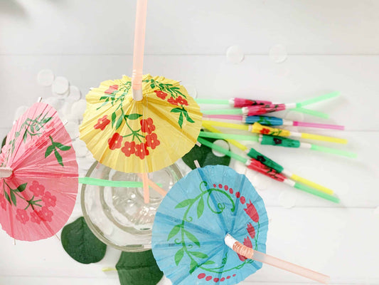 Bring a touch of tropical flair to your next cocktail with our colorful drink umbrellas! Perfect for adding a festive touch to your Mardi Gras celebration, pool party, or beach vacation, these umbrellas come in a variety of bright colors and are the ultimate accessory for your drinks. #drinkumbrellas #cocktailaccessories #mardigras