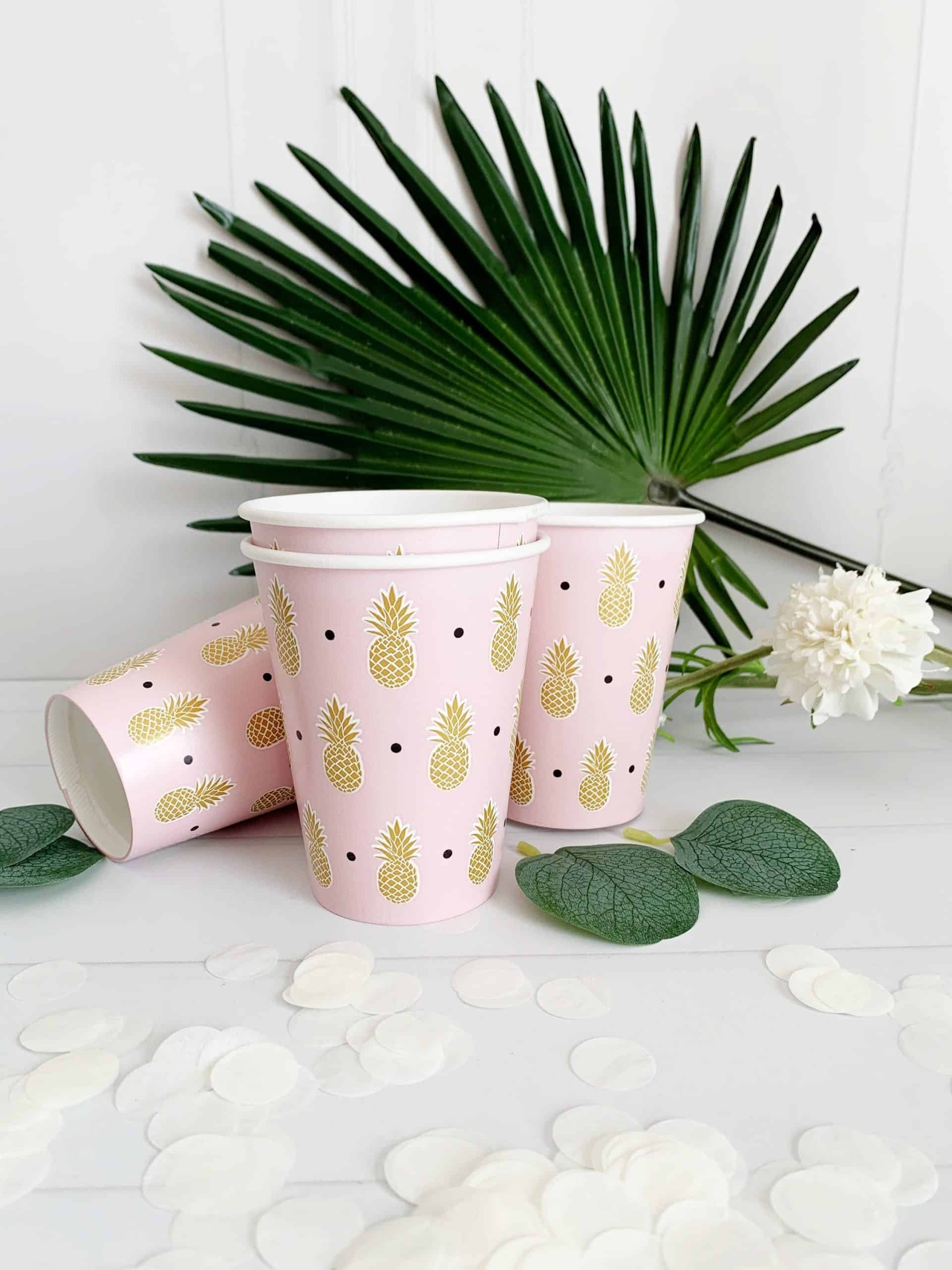 A set of 8 Bach and Boozy Beach Pineapple Cups, with gold pineapple on blush pink background. Perfect for a beach bachelorette or tropical themed event.