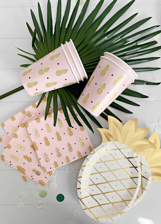 Bring a touch of tropical paradise to your next party with our Pink Pineapple Pool Party in a Box. Set includes 8 cups, 8 pineapple plates, and 16 pink and gold pineapple napkins. Perfect for a bridal shower, bachelorette, or pool party. #PineapplePoolParty #PinkPineapple #SummerParties