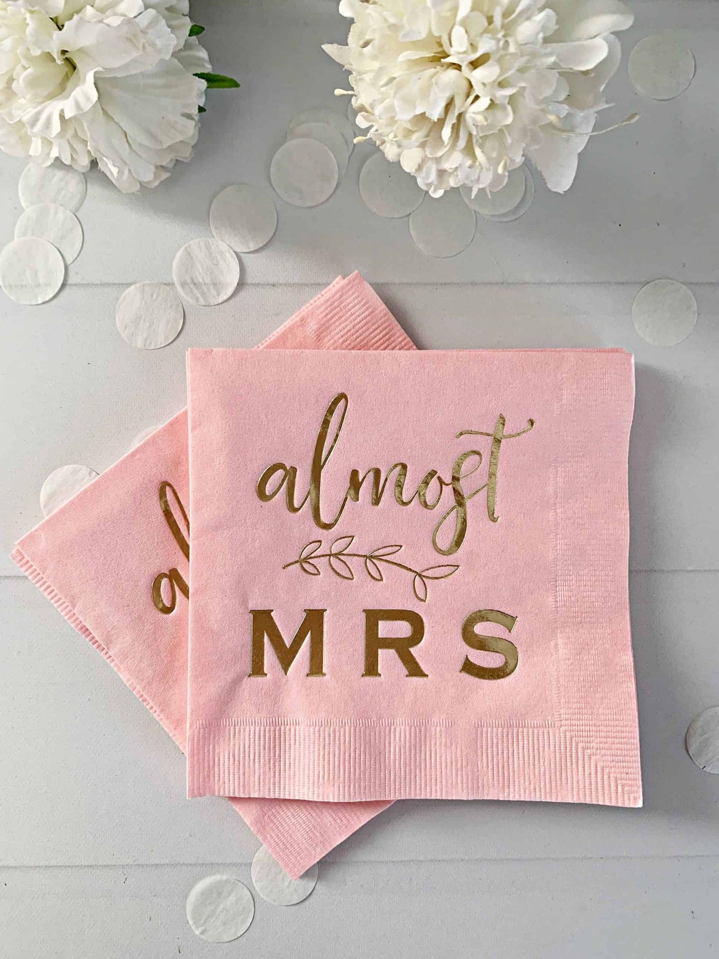 Almost mrs cocktail napkins in blush with gold letters for a bridal shower