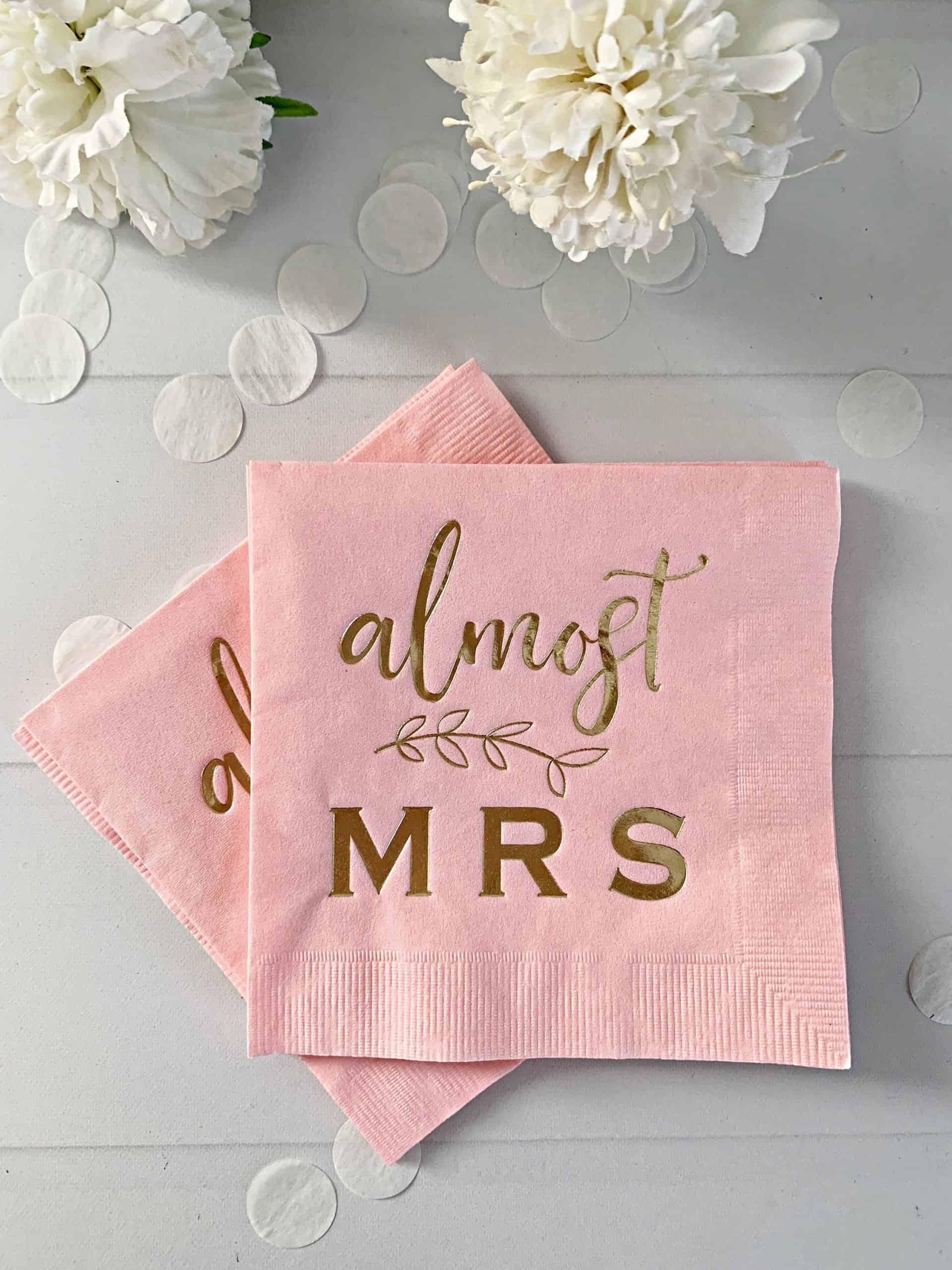 Almost mrs cocktail napkins in blush with gold letters for a bridal shower