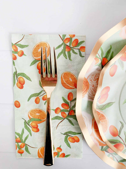 A pack of 20 dinner-sized napkins featuring watercolor citrus fruits on a pale mint background, ideal for a Little Cutie-themed baby shower