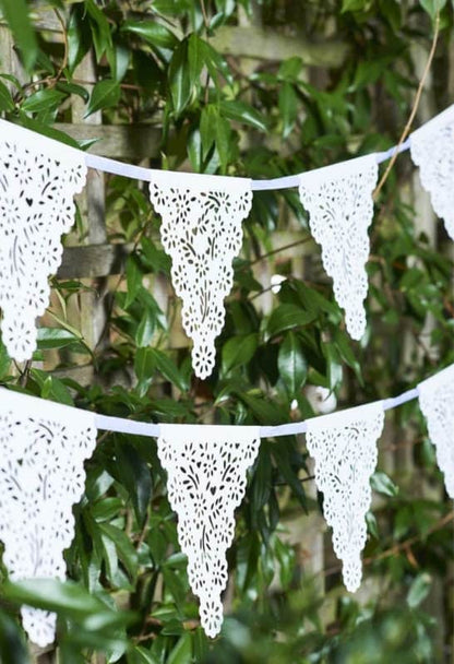 Add a touch of elegance and sophistication to your party decor with our intricate White Paper Lace Bunting. Perfect for baby showers, weddings, or bridal showers, this bunting is sure to impress with its delicate cutout details that give the impression of real lace.