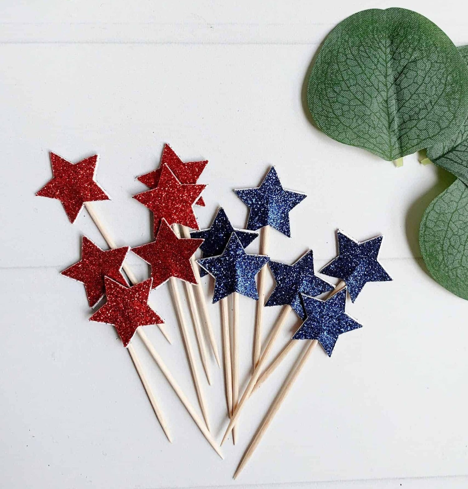 These little star red/blue cupcake and charcuterie picks are perfect for your patriotic picnics. Top treats to welcome home your military member, for Memorial Day, 4th of July, and a Patriotic Backyard BBQ.