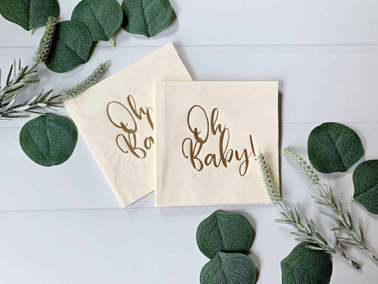 Oh Baby cream cocktail napkins - with gold foil - the perfect accent to your baby shower.  These gorgeous gold foiled "Oh Baby" napkins are an EnFete original product. You won't find them anywhere else!