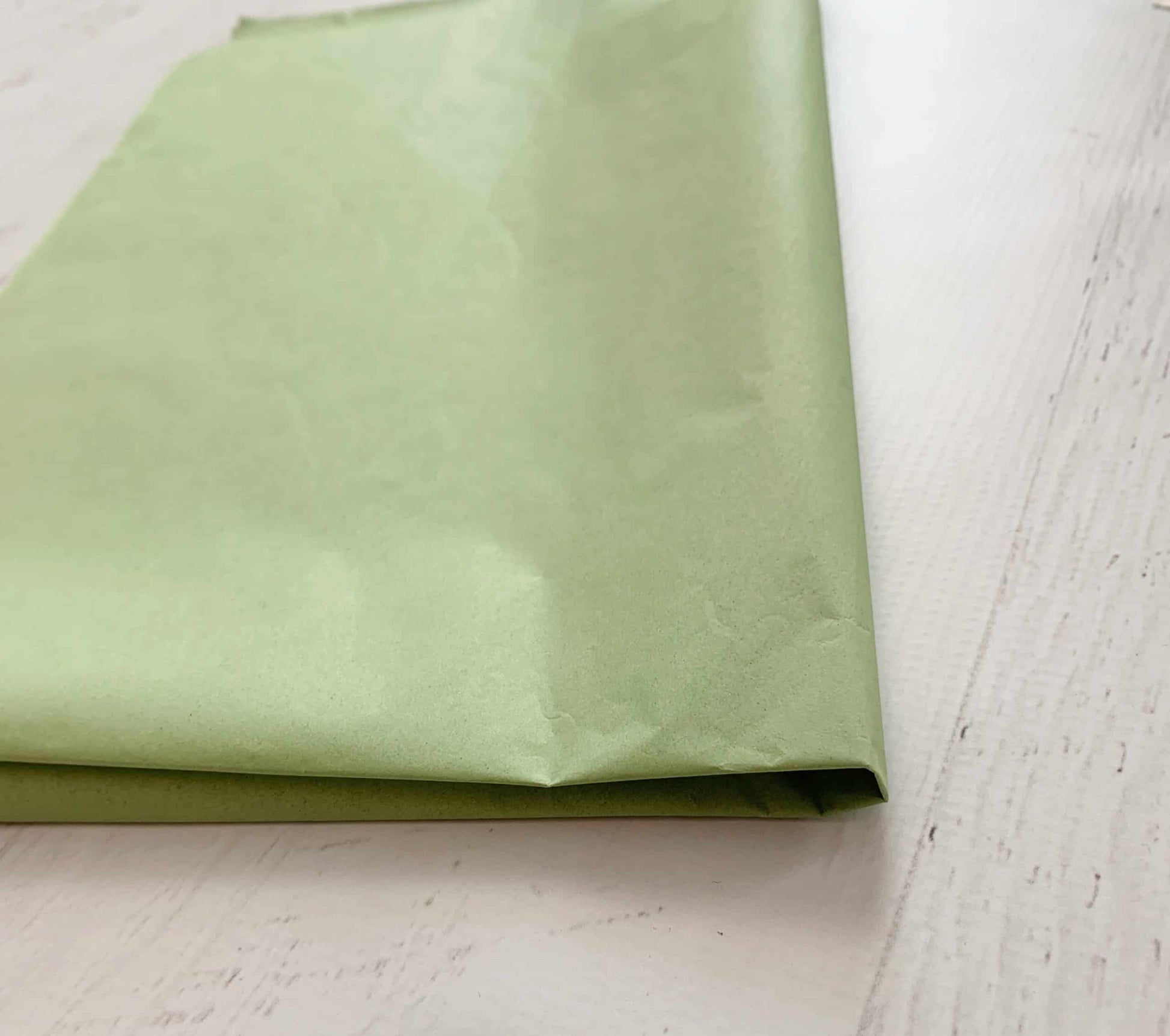 Sage tissue paper for wedding welcome bags, favor wrapping and gift giving. EnFete has wide selection of colors and patterns for weddings bridal showers and other events.