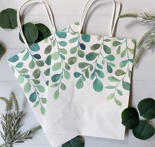 These sage and emerald watercolor eucalyptus greenery paper gift bags are perfect for wrapping favors and gifts. Perfect for a safari baby shower, bridal shower, wedding welcome or other use.