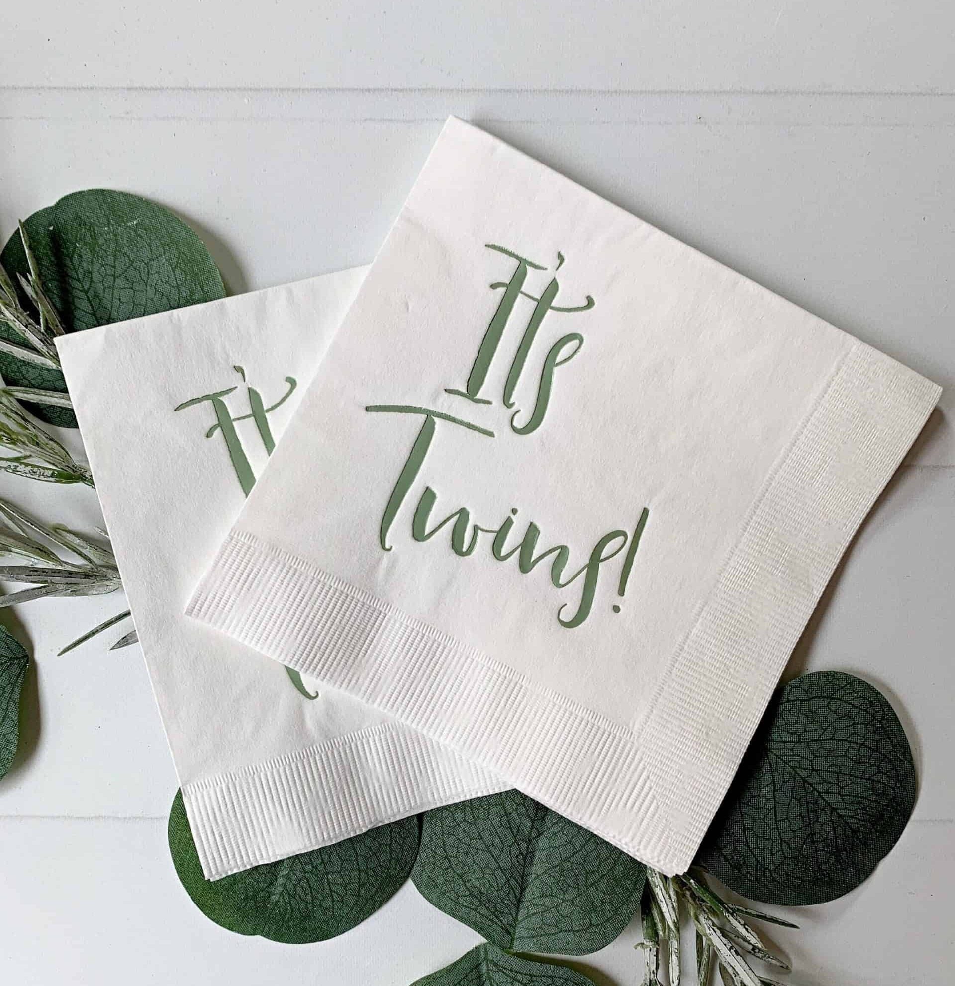 It's Twins! sage green foil on white cocktail/beverage-sized napkins - the perfect accent to your baby shower. These gorgeous gold foiled "It's Twins!" napkins are an EnFete original product. You won't find them anywhere else!