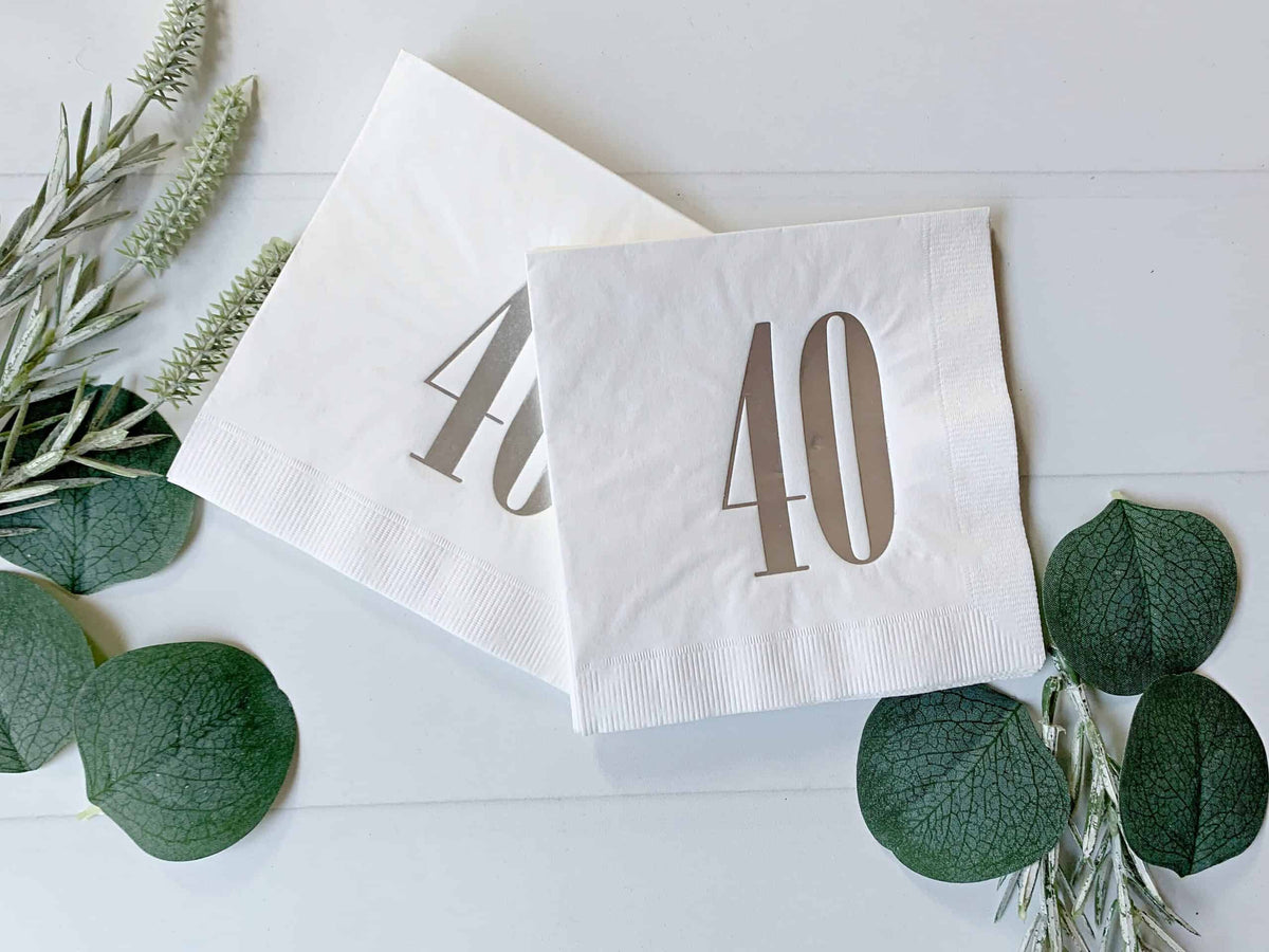 
    40th Birthday Napkins - White &amp; Silver, the designer-recommended anchor napkin for the 40th Birthday Party Supplies &amp; Decorations collection
  