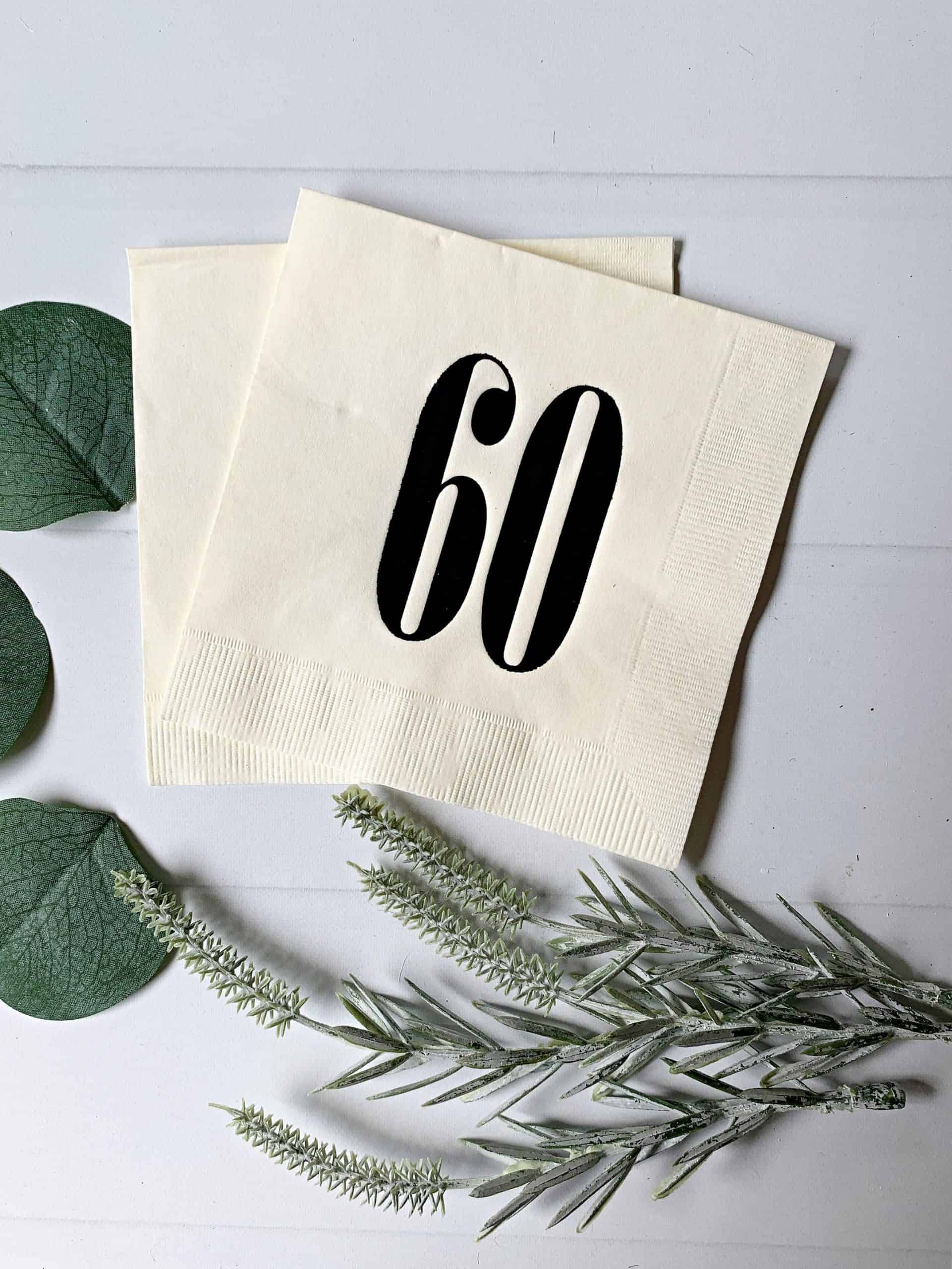 Add a touch of retro charm to your birthday or anniversary celebration with our black on ivory 60 napkins. These high-quality paper napkins feature a bold and stylish '60' design, perfect for a milestone celebration. With their classic black and ivory color scheme, these napkins will complement any party theme or decor. Order now and bring a touch of vintage flair to your special occasion!