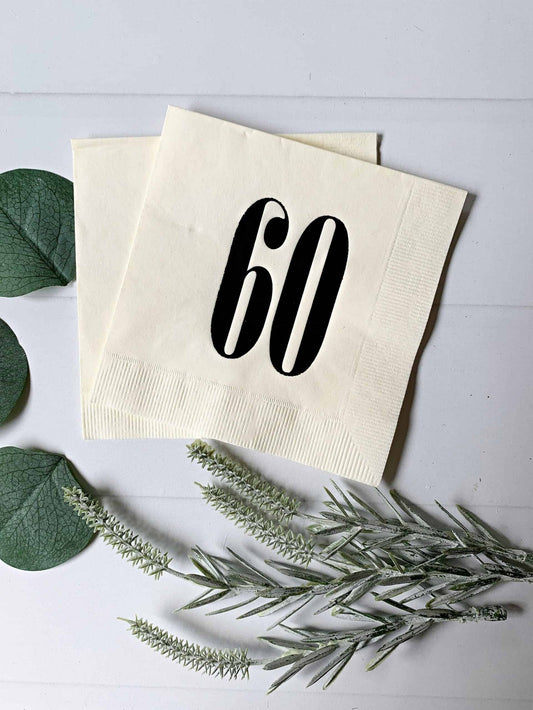 Add a touch of retro charm to your birthday or anniversary celebration with our black on ivory 60 napkins. These high-quality paper napkins feature a bold and stylish '60' design, perfect for a milestone celebration. With their classic black and ivory color scheme, these napkins will complement any party theme or decor. Order now and bring a touch of vintage flair to your special occasion!