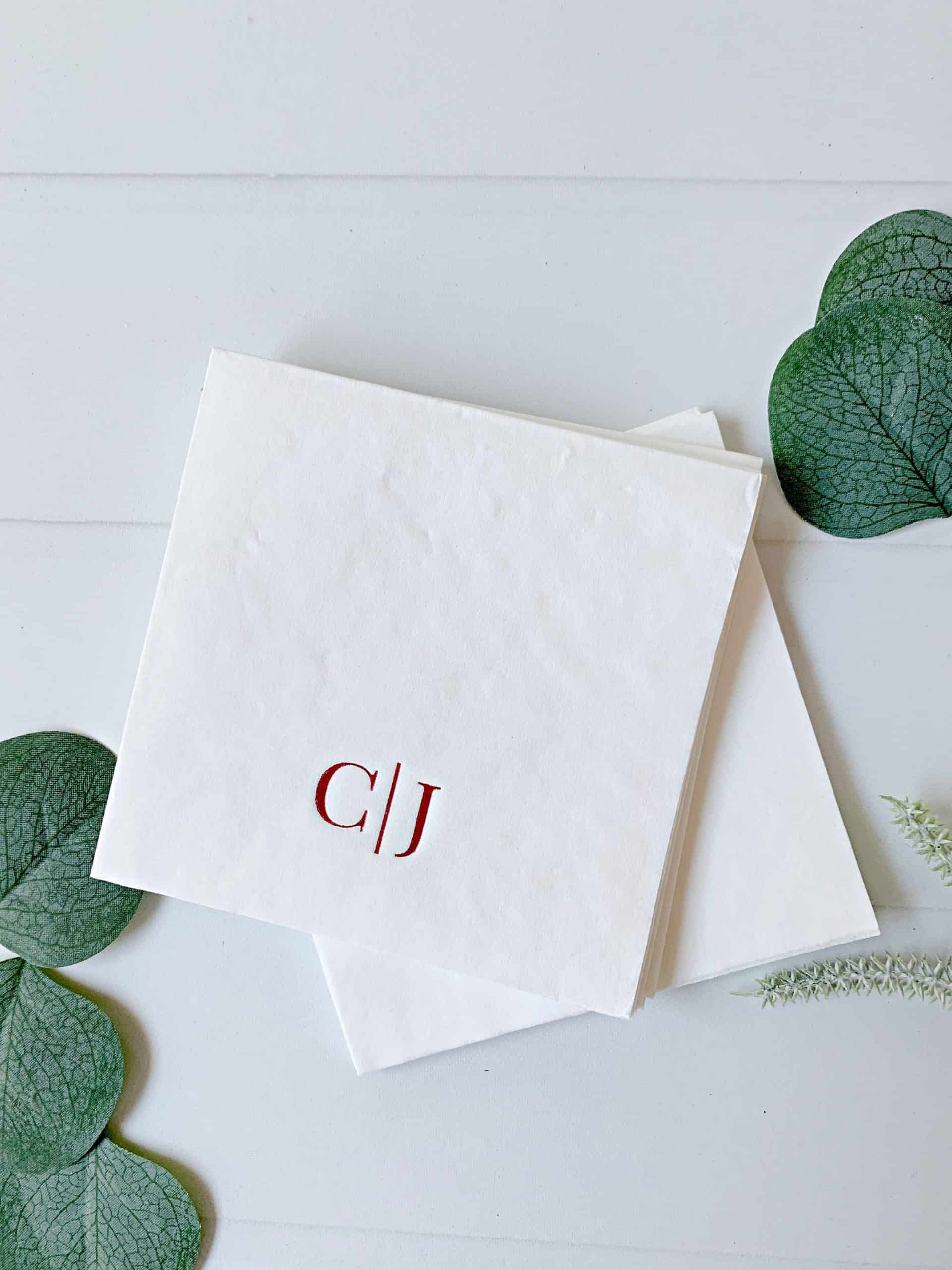 Add a personalized touch to your wedding toast, champagne wall or wedding bar with these personalized cocktail-sized initials napkins.