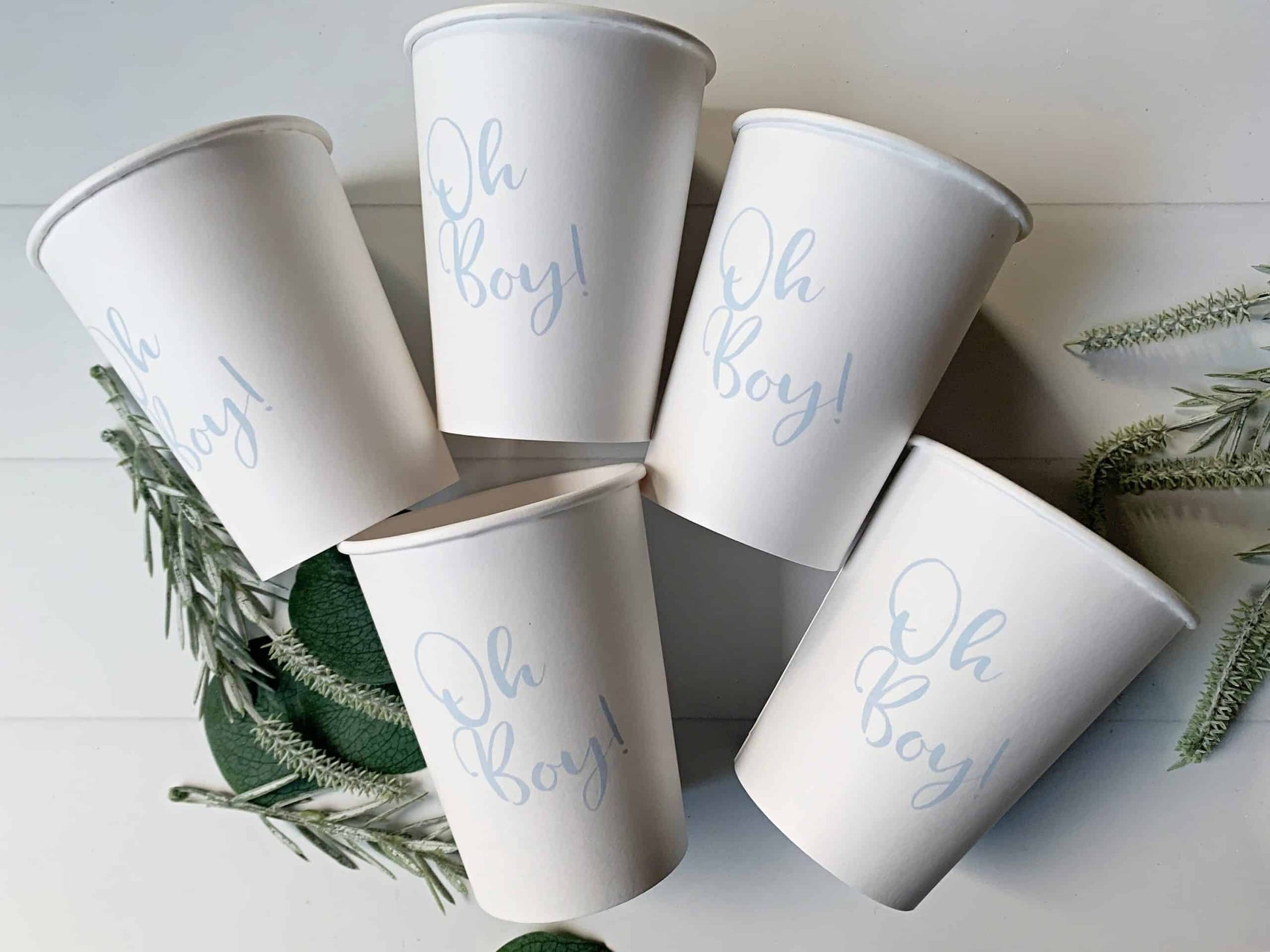 Oh Boy!' Cups in Ice Blue, perfect for baby shower drinks. Each pack contains 8 cups that can hold approximately 9 oz of hot or cold beverages.